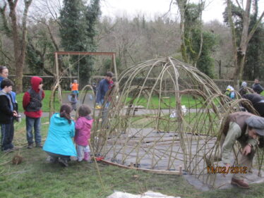 Working with the community on a living willow sculpture at Rinville Park | Aine Clarke