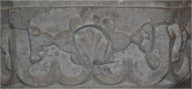 Scallop shell detail on baptismal font in Woodlawn