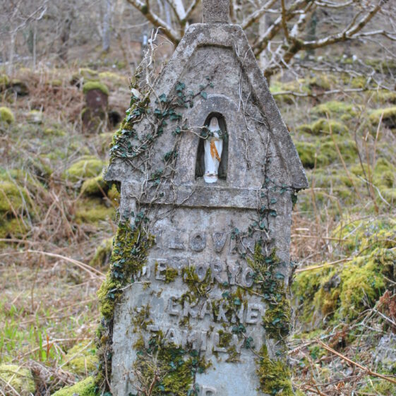 Concrete Cross with statue in niche | Christy Cunniffe