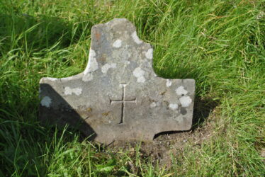 Sandstone cross with incised cross. | Christy Cunniffe