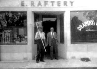 Ted Raftery on right, outside shop in 1950s. | Lilian Higgins