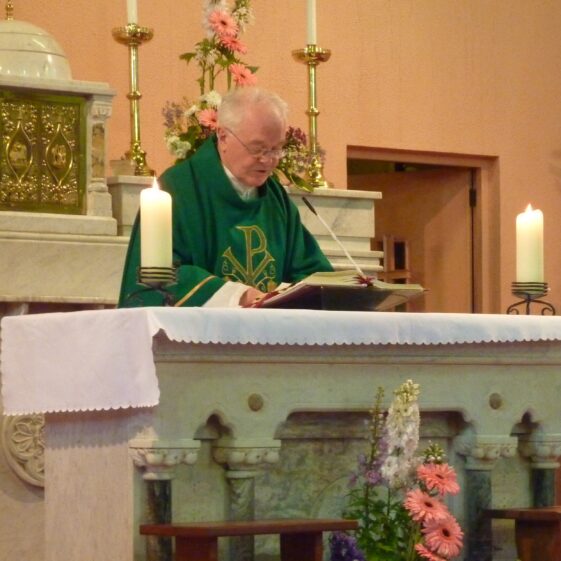 Canon Kieran Waldron P.P., celebrating Mass in St. Mary's Church in Killererin.