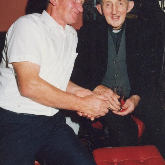 Johnnie-Reynolds-and-Archdeacon-Conor Heaney Johnny Reynolds, Cloonlusk with Archdeacon Conor Heaney, P.P. 9th July, 1991 at the 50th wedding anniversary of Pake and Bridie Kirwan, Lissavalley. | Photo: Eileen Reynolds, Cloonlusk