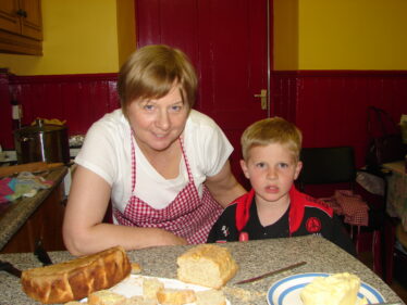 Margaret Tighe demonstrating breadmaking skills in Barnaderg Community Centre, 2009 | Photo: Bernadette Forde