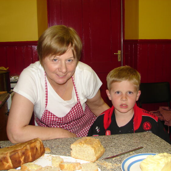 Margaret Tighe demonstrating breadmaking skills in Barnaderg Community Centre, 2009 | Photo: Bernadette Forde