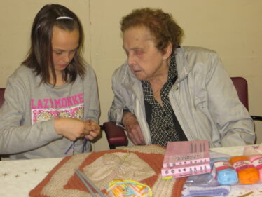Rebecca learns to knit taught by Mary Nolan