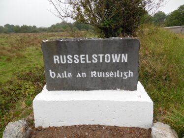 Welcome stone with Russelstown etched into it