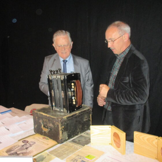 Frank Glynn & Christy Cunniffe with PJ Conlon's musical instrument