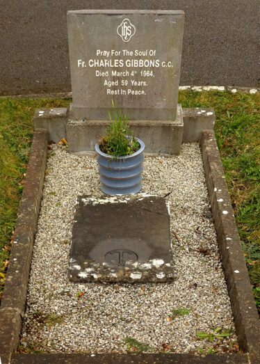 The final resting place and headstone of Fr Charles Gibbons CC DD. This is not the original stone - it has been lifted and just left back in the centre of the grave facing the wrong way and it's sad that DD has been omitted from the new stone as this was very important to Fr Charlie and caused much controversy in his lifetime. | © Gerry Costello Photography