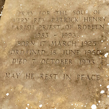 Inscription on the Gravestone of Fr Patrick Henry in Robeen Church Grounds | © Gerry Costello Photography