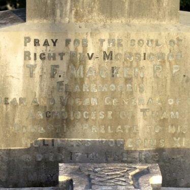Inscription on the Gravestone of Fr Tom Macken. | © Gerry Costello Photography