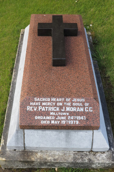 Final resting place and gravestone of Fr Paddy Moran in the grounds of Newport Church, Co. Mayo | © Gerry Costello Photography
