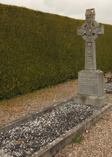 Final Resting Place and Headstone of Fr Patrick Joyce in Corrofin Church | © Gerry Costello Photography