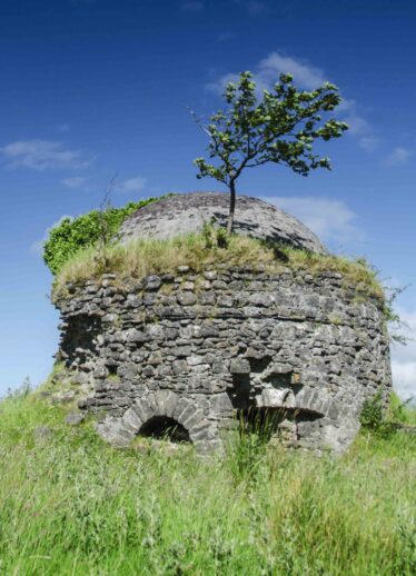 Looking north showing the ice house with a clear blue sky in background