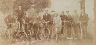 A gathering of men and their bicycles at the gamekeeper's house, Woodlawn Estate | By John Heuston, Courtesy of Alf Seale 
