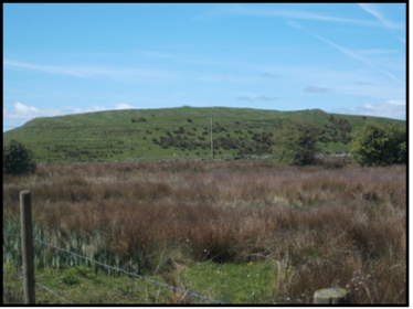 Looking west showing Recorded Monument GA086:074 (Ringfort)