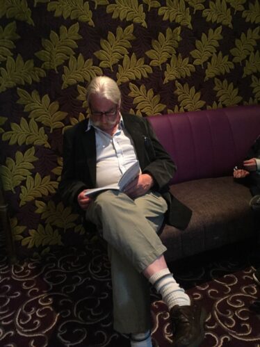 Gentleman reading quietly at Book Launch of Woodlawn - A History