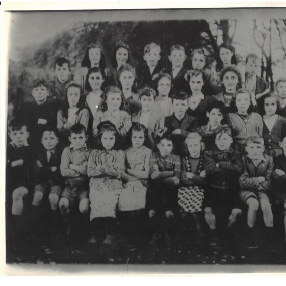 Front row, left to right: Billy Quinn, Tommy Flynn, Christy Varley, Philomena Feerick, Nora Kirrane, Monica Garvey, Olive Keane, Joe Kelly, Johnny Quinn, Mattie Diskin, John Curran. 
Second row: Tom Kelly, Mary Steede, Mary Hennelly, John McGagh, Sonny Fleming, Billy Garvey, Mary Quinn, Helen Waldron, Sheila (Sal) Blake
Third row: Mike Feerick, Mary Waldron, Phyllis Feerick, Rosaleen Murphy, Margaret Corless, Nellie McGagh, Michael Diskin, Paddy Tully
Fourth row: Kathleen Maloney, Catherine Kelly, Paddy Kirrane, Liam Varley, Brigid Hynes, Mary Connolly, Jim Curran, RIP | Thanks to John Waldron and family for sharing