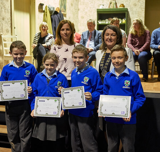 four students getting certificates from Milltown school Sandra Burke & Cllr Eileen Mannion with students from MNS | Photo: Tuam Photo Studio