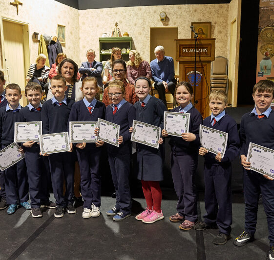 ten students from Belmont receiving certificates Students from Belmont receiving certificates | Photo: Tuam Photo Studio