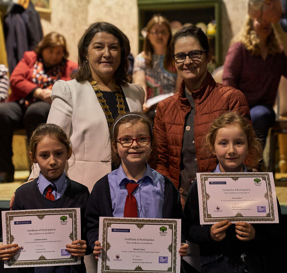 three pupils from Belmont with certs Cllr Eileen Mannion, Eleanor Sheridan with pupils from BNS | Tuam Photo Studio