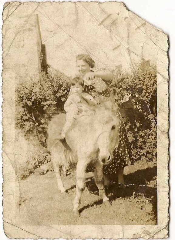 Bridget & Eileen as a child on their farm.