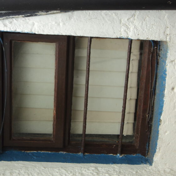 Barred back window of Joyner's Public House [2] | Photo: Bernadette Forde
