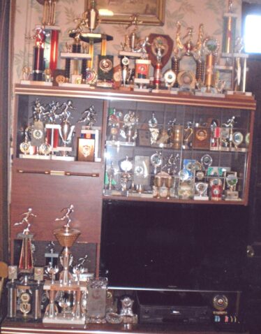 Some of the medals and trophies won by Mickey Kelly, Coolreagh, during his lifetime. | Killererin - A Parish History