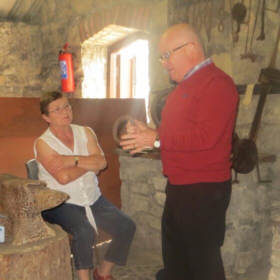 Mary-Clery-and-Jimmy Mary Clery listing intently to Jimmy our guide at The Forge Museum | Bernadette Forde