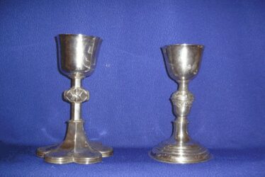 The Creevaghbaun chalice dating from 1747 on right of photo and 2nd chalice is in memory of the Deane and Kirwan families | Killererin Heritage Society 2015