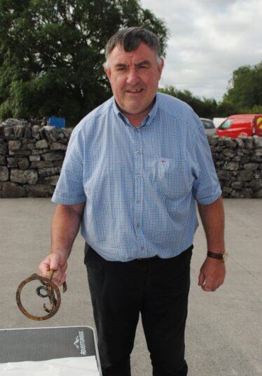 Tom Whelan showing the Corbishley branding iron | Christy Cunniffe