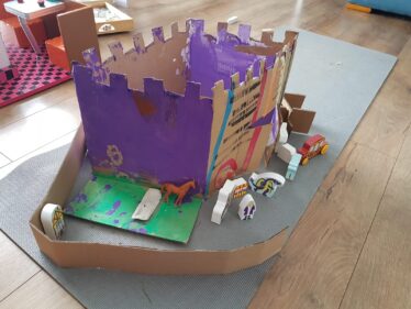 Cardboard castle, painted purple
