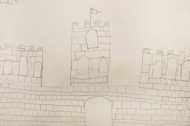 Stone Castle with three towers and big door to the front