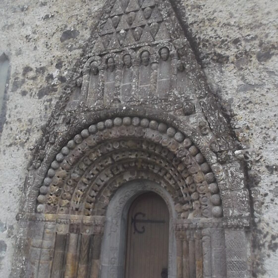 Romanesque doorway of seven orders, Clonfert Cathedral, splays towards the base, Each column is designed differentlywith zoomorphic and geometric designs. The innermost is a later addition of 15th Century. | B. Doherty, 2019