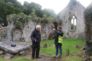 Discussions at Kilboght. Two men chatting within Kilboght church ruins