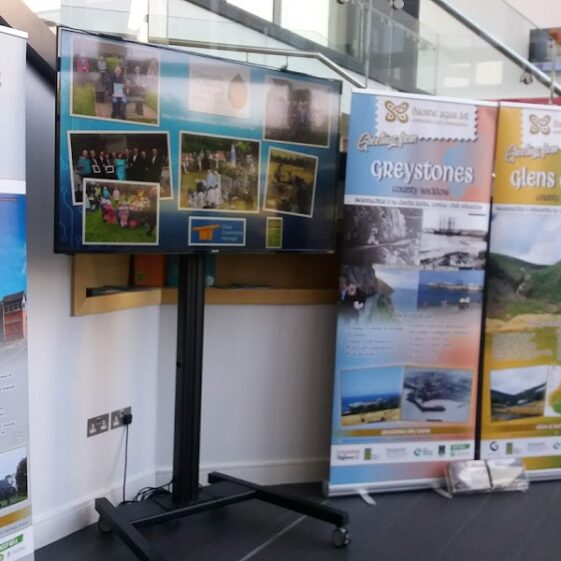Digital Posters displayed on screen, Pull up banners alongside displaying Daoine agus Ait Project | B. Doherty