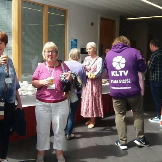 People mixing and having a cup tea | B. Doherty