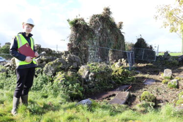 Young man, James TY student standing at church ruin | B. Doherty 2022