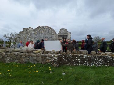 chancel wall in foreground and transept chapel in background.