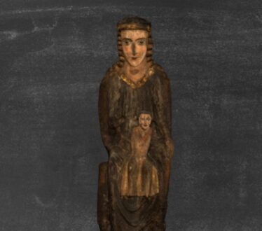 Kilcorban Mother and Child Statue, Our Lady holdign child low in front of her tummy. Wooden Statue, elongated face