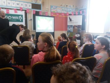 children listen attentively