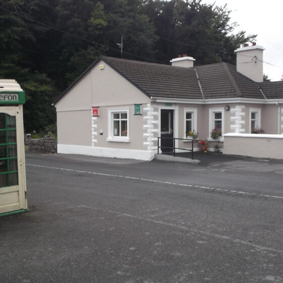 2-Post-Office-Gate-House Woodlawn Post Office 2018 showing cream painted bungalow, with telephone box across the road. Once was gate house to Woodlawn House | B. Doherty 2018