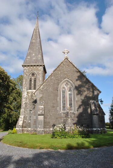 Sun shining on Woodlawn Church, looking North