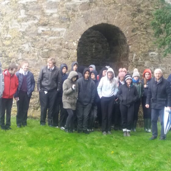 Group standing outside the entrance to the family mausoleum | B. Doherty 2020