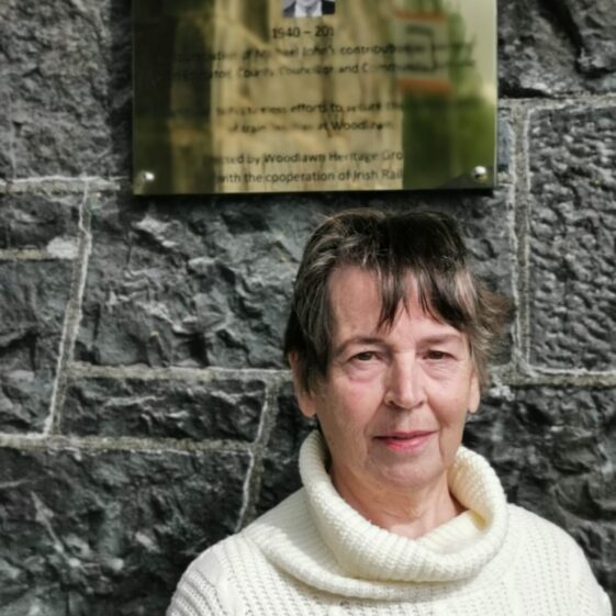 IMG-20200901-WA0007 Maureen, Michael Johns wife standing beside the plaque | M. Kenny