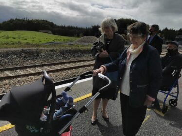 Woodlawn Heritage Group gather on the platform and welcome The Kilgannon family