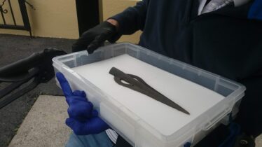Bronze Age Spearhead is in a white protective box to enable it to be transported to John Hynes at Mountbellew Nursing Home