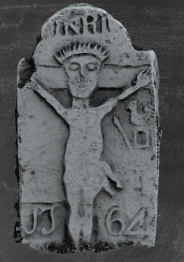 Crucifixion detail on stone.