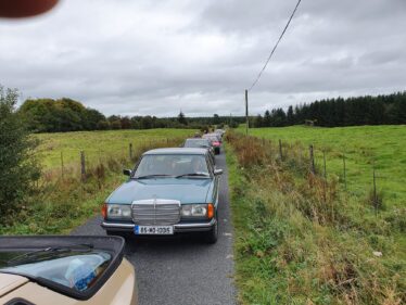 A long queue of cars on the Golden Mile of Woodlawn