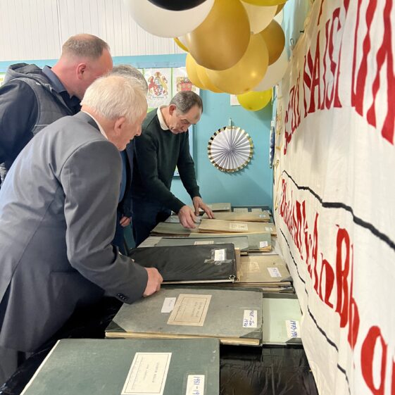 Past Pupils looking at Roll Books | Courtesy of Patricia Kenny Photography
